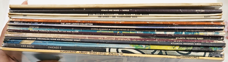 Seventeen LP record albums, including a stereo The Beatles ‘White Album’, top loading cover with one black inner sleeve (one missing), no. 0536905, together with artist including; Wings, the Byrds, the Carpenters, John L